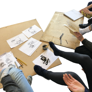 Charcoal drawings on the floor