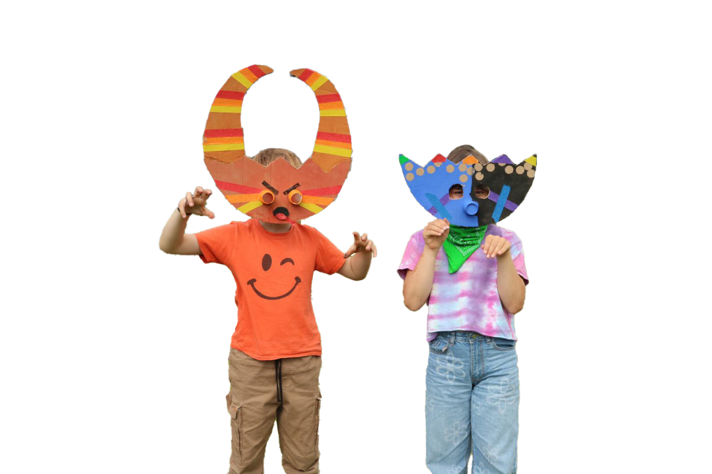 Two children wearing colourful hand-made folk masks
